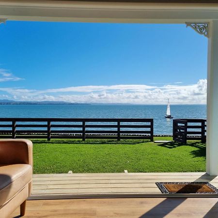 Clarks Beach Red Rock Cottage, Beachfront Luxury מראה חיצוני תמונה