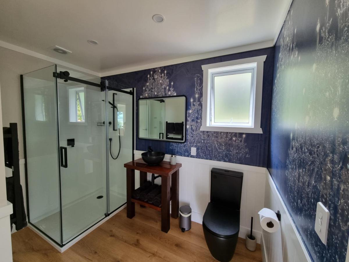Clarks Beach Red Rock Cottage, Beachfront Luxury מראה חיצוני תמונה