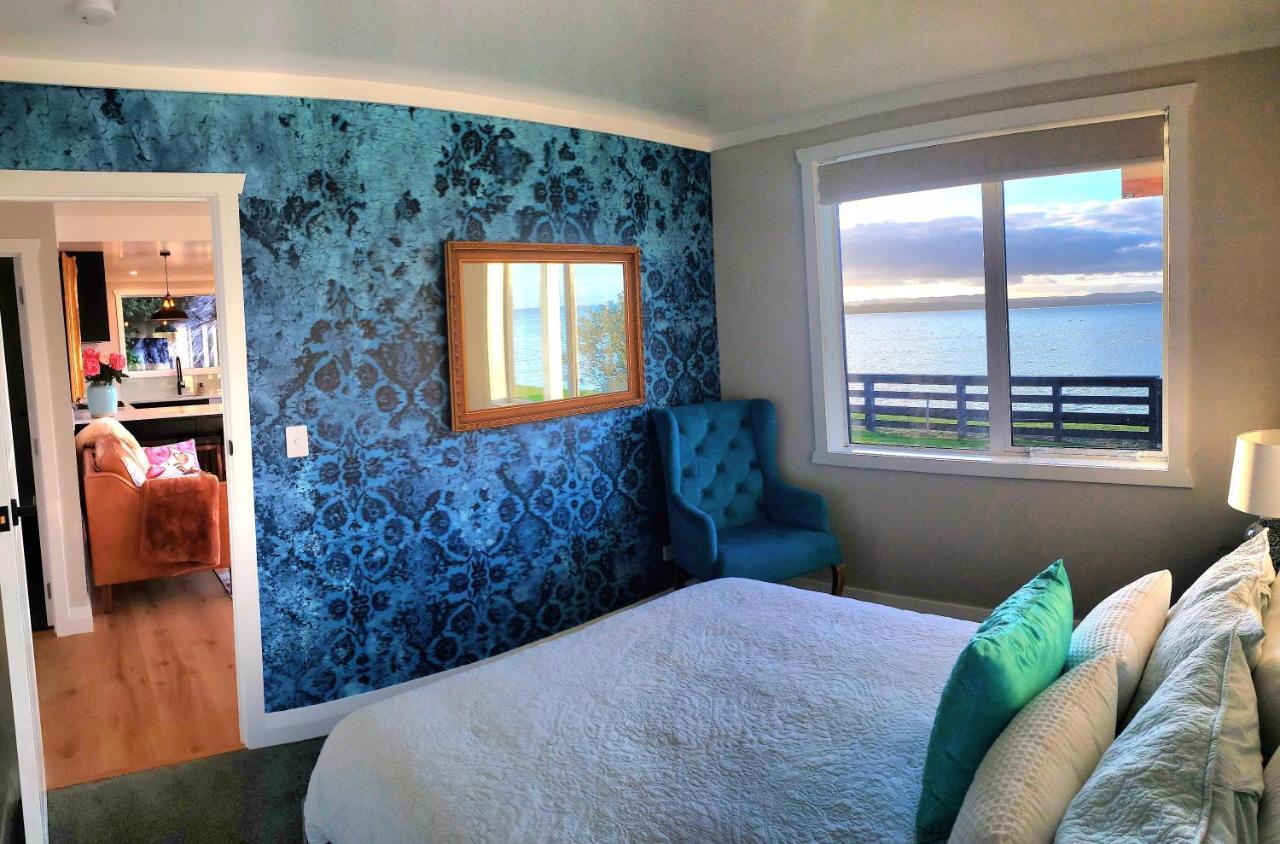 Clarks Beach Red Rock Cottage, Beachfront Luxury מראה חיצוני תמונה