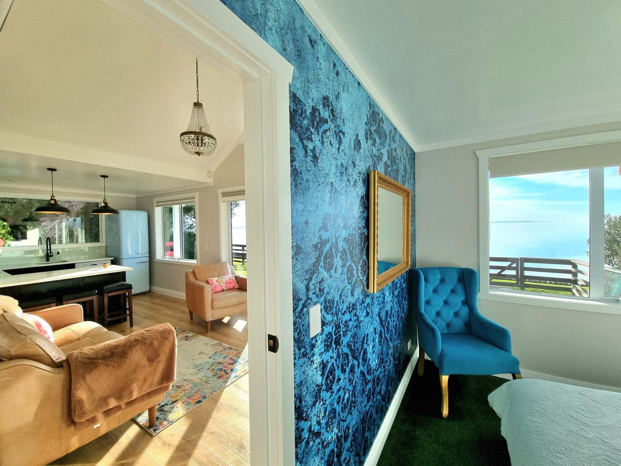 Clarks Beach Red Rock Cottage, Beachfront Luxury מראה חיצוני תמונה