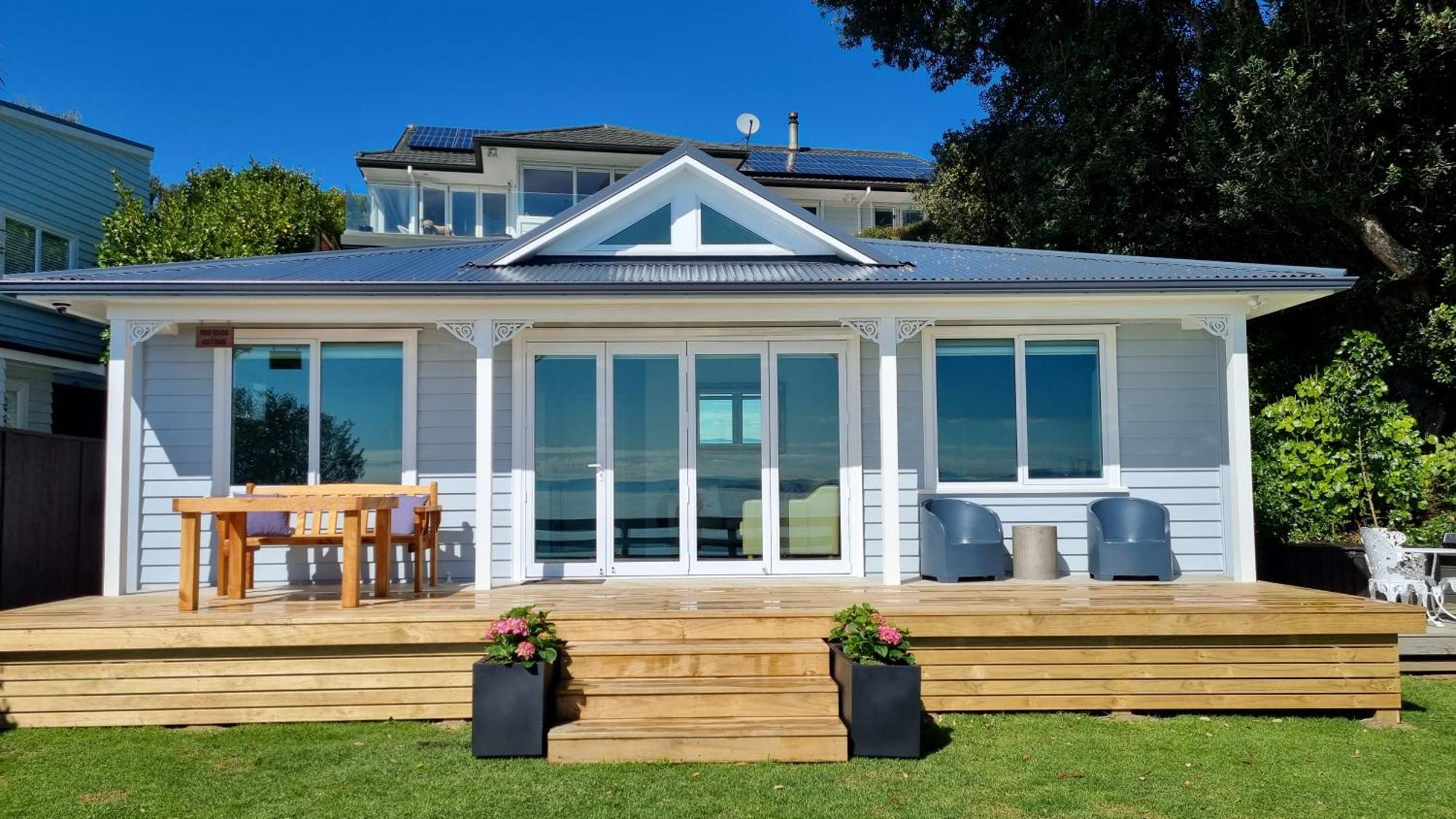 Clarks Beach Red Rock Cottage, Beachfront Luxury מראה חיצוני תמונה